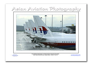 MY-086 - Malaysia Airlines Boeing 737-4H6 tails at KLIA